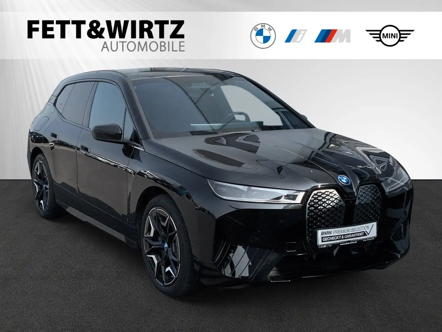 BMW iX xDrive50 Sportpaket|SkyLounge|DAProf.|22"LMR Zwart - 1