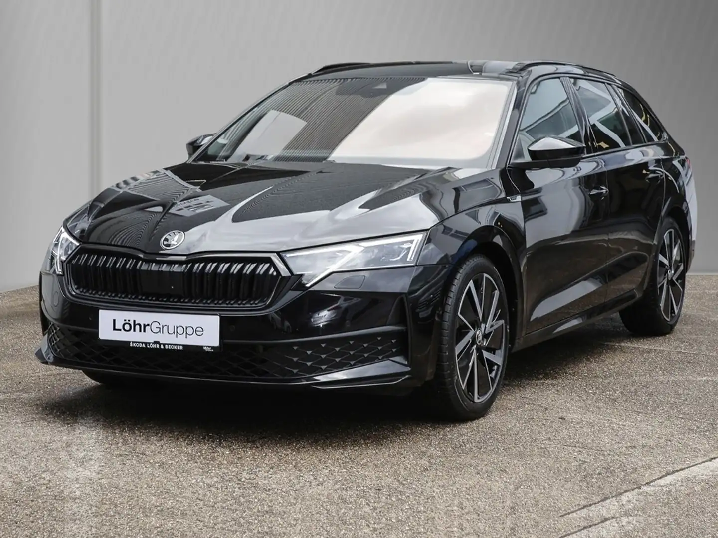 Skoda Octavia Combi 2.0 TDI DSG Sportline AHK/Navi Zwart - 2