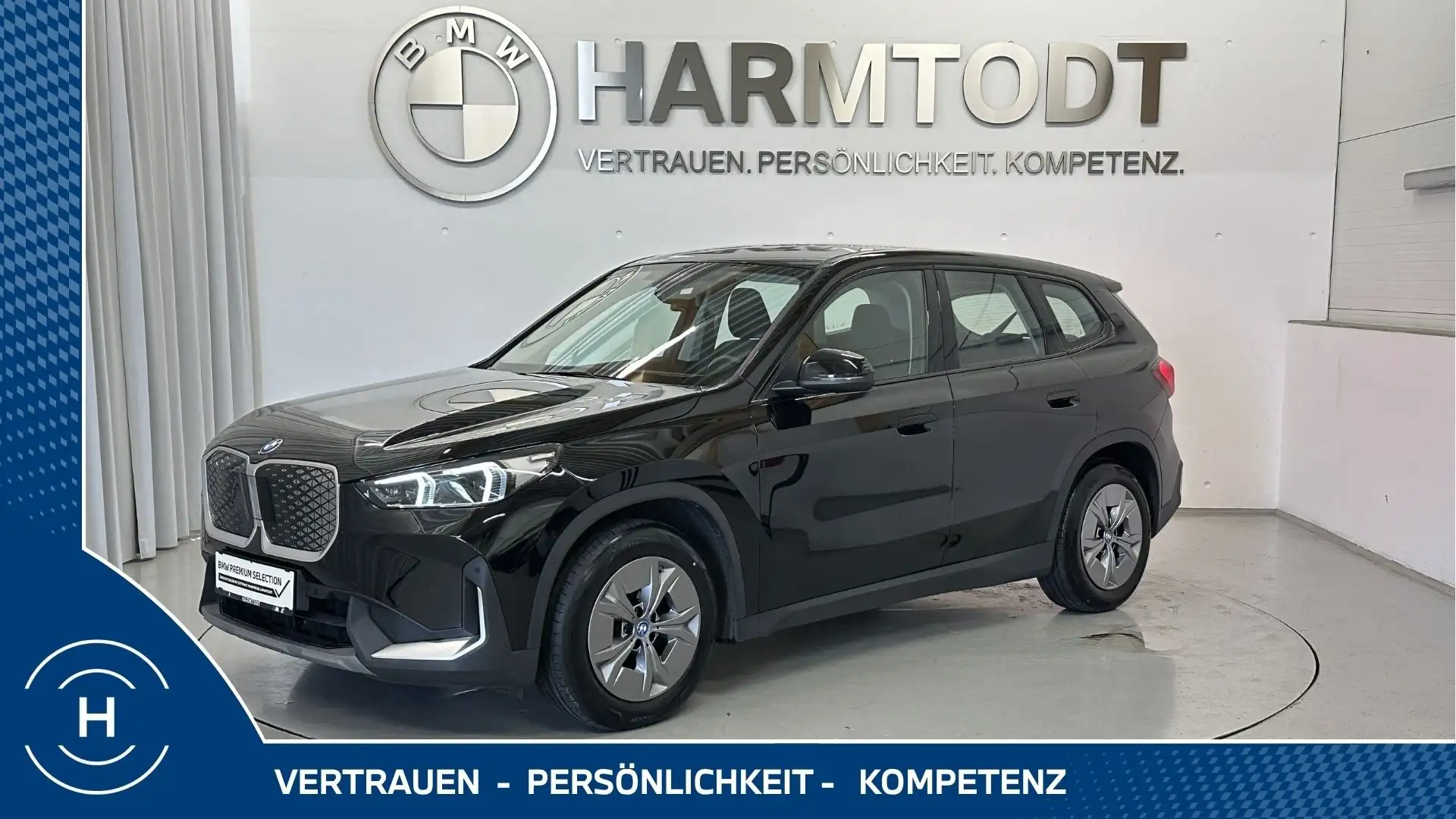 BMW iX1 eDrive20 *Premium Paket / AHK / LHZ* Schwarz - 1