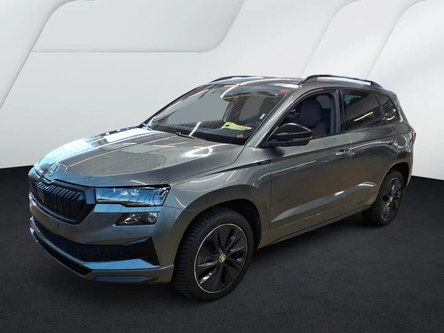 Skoda Karoq 1.5 SPORTLINE PANO CAM LM18 E-KLAPPE NAVI Grijs - 2