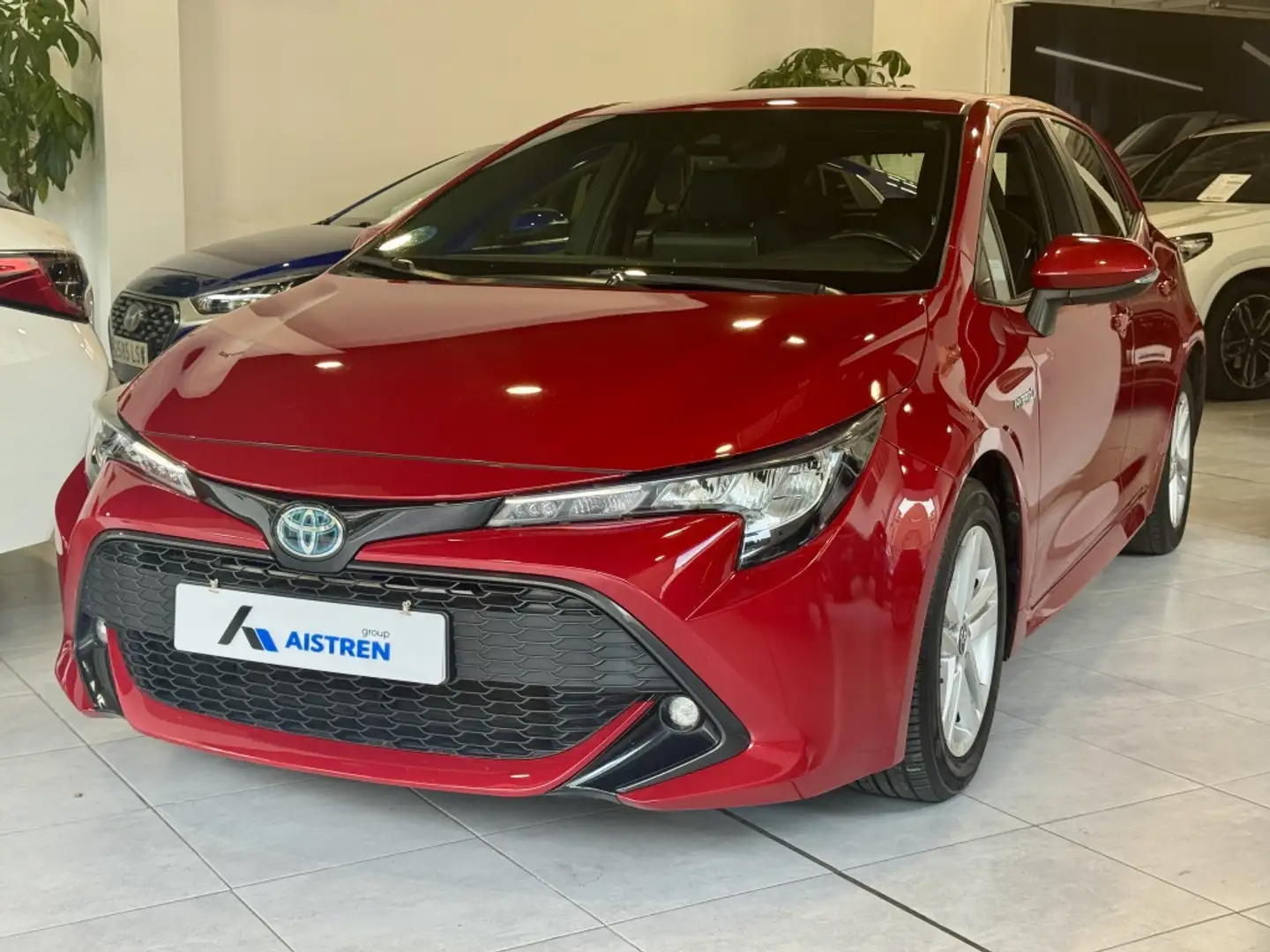 Toyota Corolla 125H Business Plus Rouge - 1