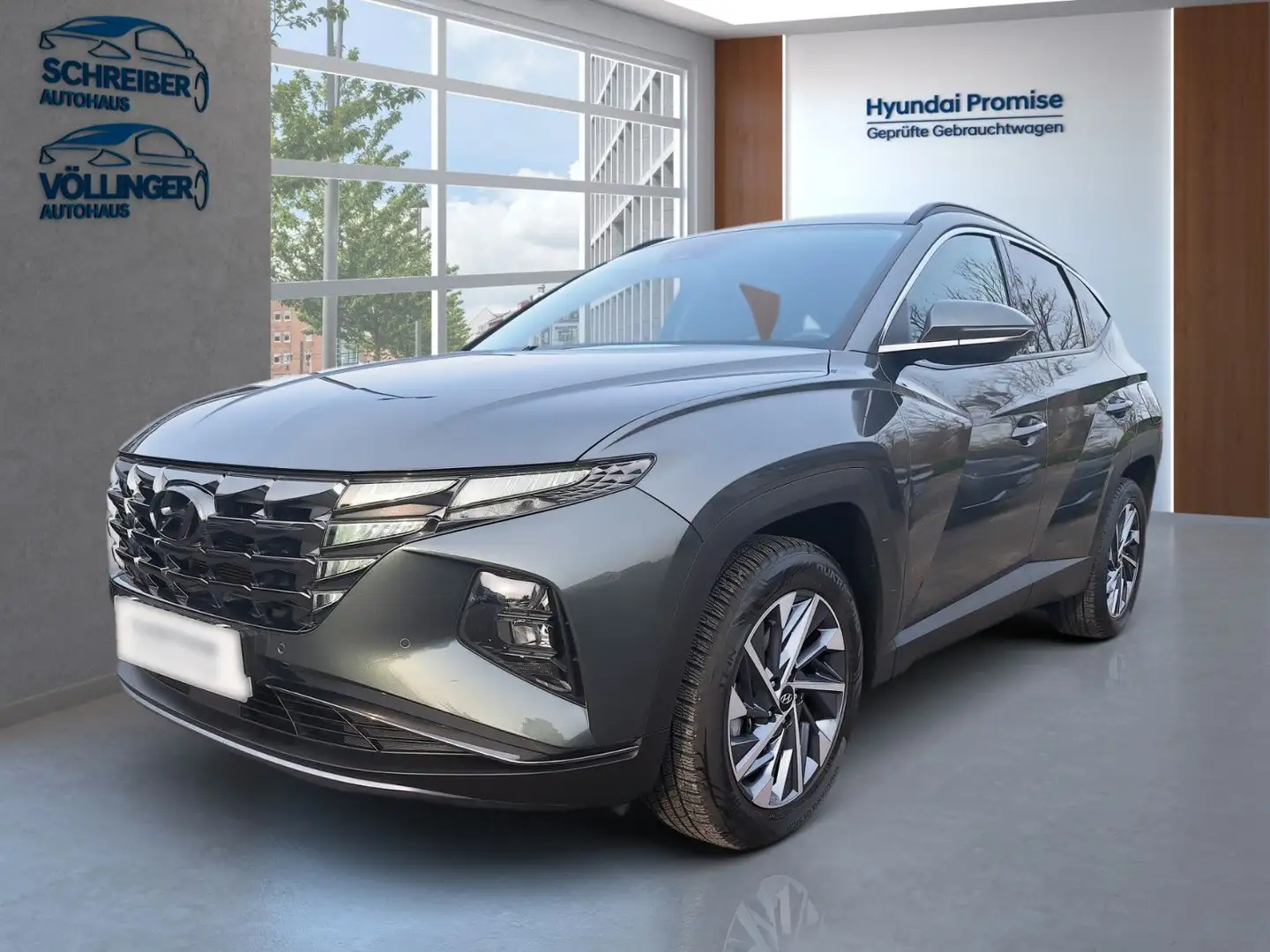Hyundai TUCSON Trend Hybrid 4WD 6-Automatik Gris - 1