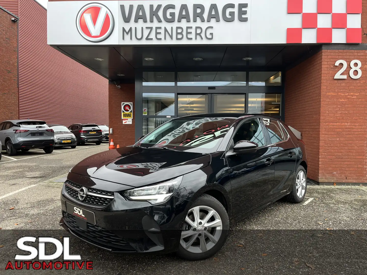 Opel Corsa 1.2 Elegance // NAVI+CARPLAY // CLIMA // CRUISE // Zwart - 1