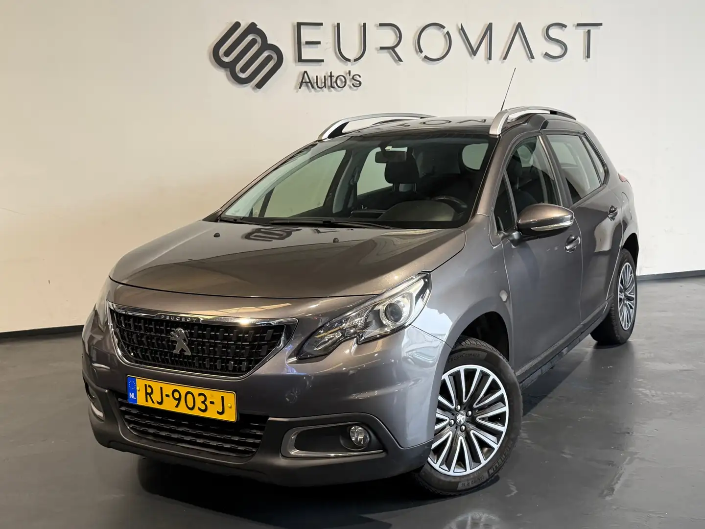 Peugeot 2008 1.2 PureTech Blue Lion Panodak Navi Cruise Airco P Grau - 1