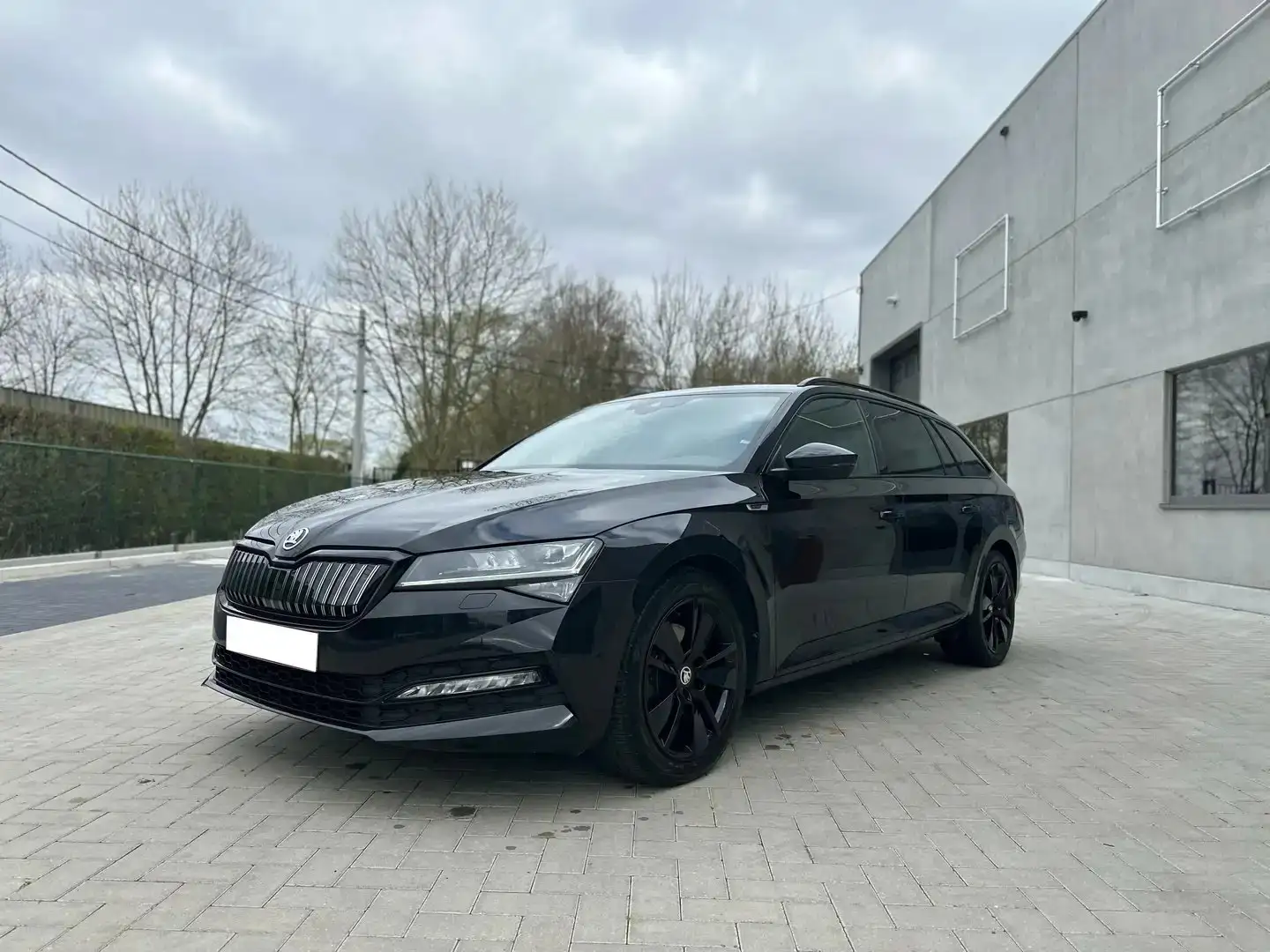 Skoda Superb Superb Combi 1.4 TSI iV DSG Sportline Zwart - 1