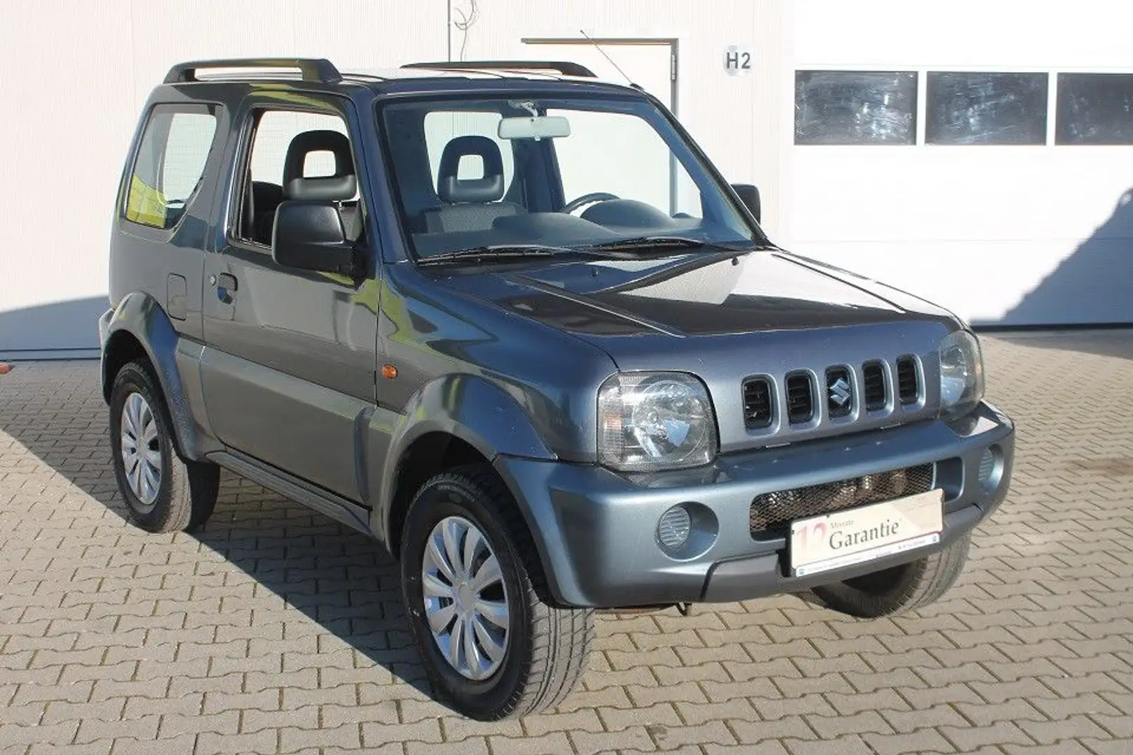 Suzuki Jimny Tüv/Au neu,Klima,AHK,4x4,gepfl,Finanz. Grau - 2