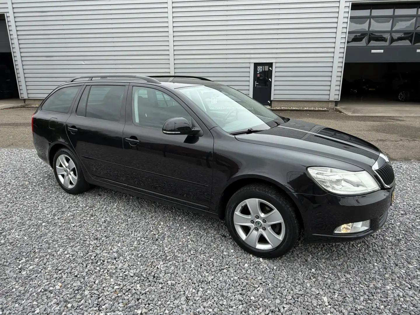 Skoda Octavia Combi 1.2 TSI Ambition Business Line Zwart - 1