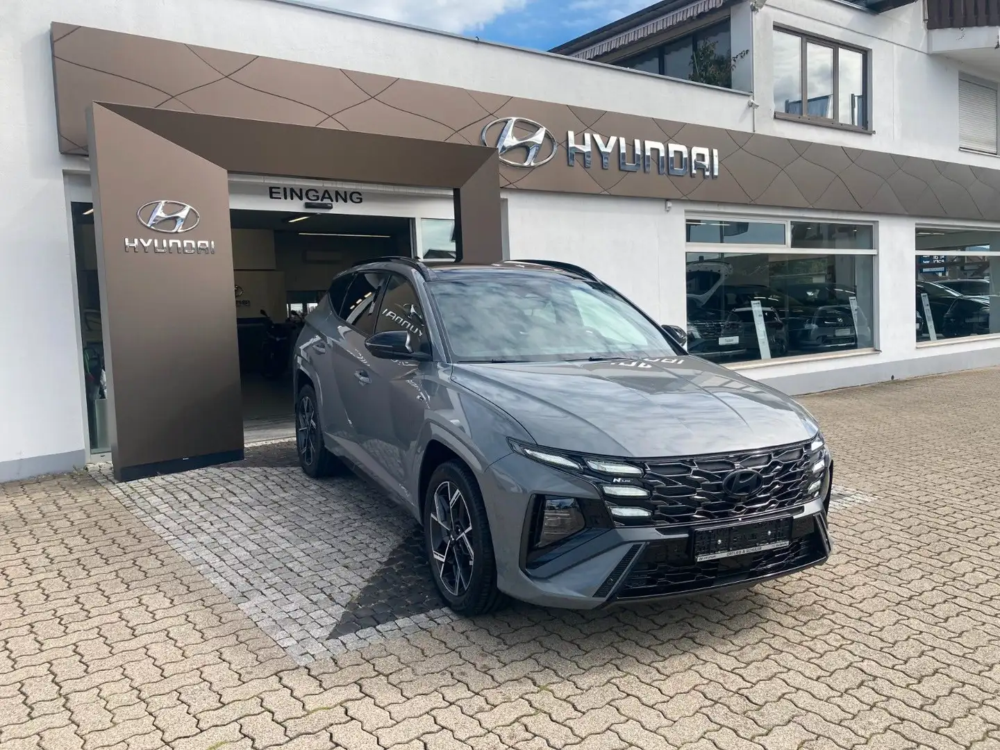 Hyundai TUCSON 1.6T-GDI Hybrid N-Line Assistenz+Sitz+ECS Grau - 1