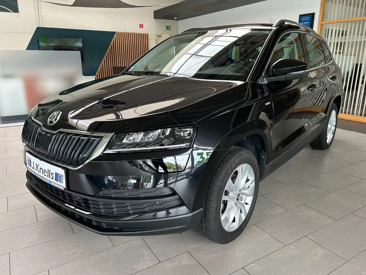 Skoda Karoq Drive 125 1.0TSI/AHK/LED/APP/DAB/SHZ/PDC Schwarz - 1