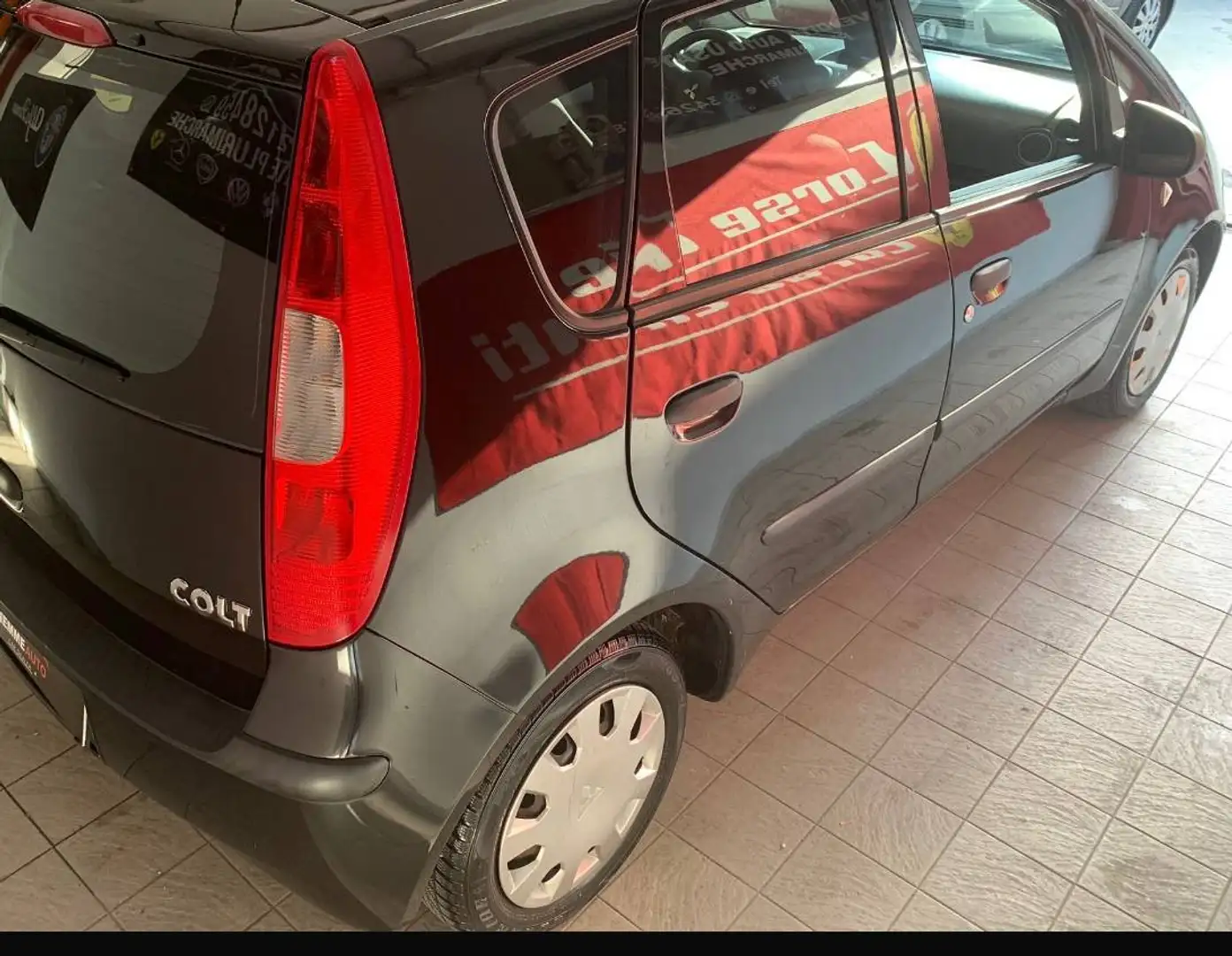 Mitsubishi Colt Colt VIII 2009 5p 1.1 Inform Gpl Fekete - 1