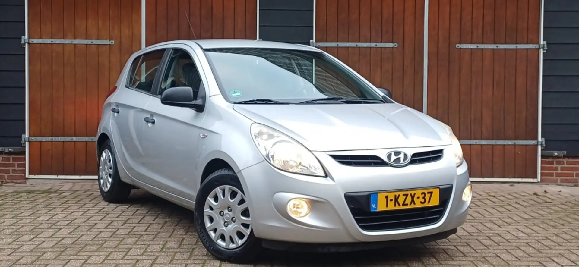 Hyundai i20 1.2i i-Motion, Dealer onderhouden, Airco, Cruise C Grijs - 1