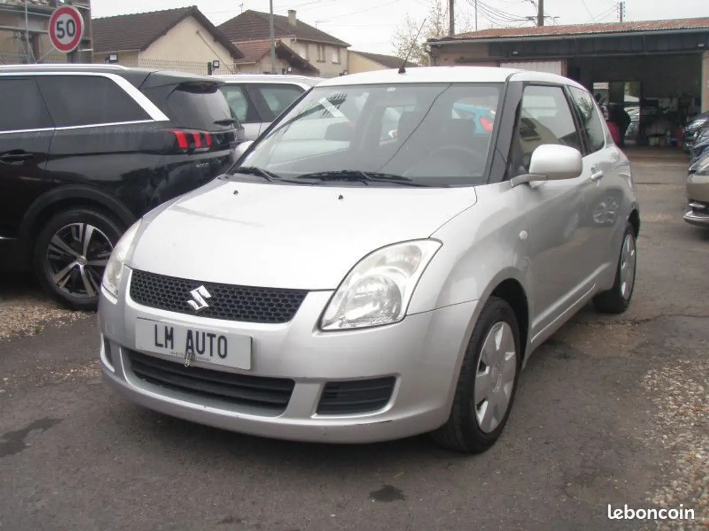 Suzuki Swift II 1.3 VVT 82 GL 3P Gris - 1