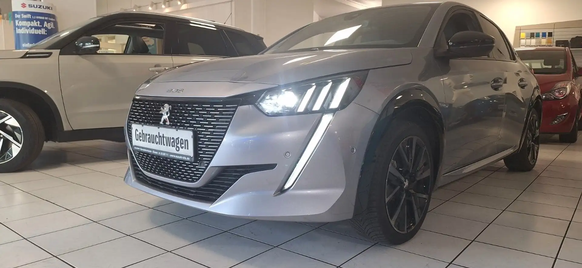 Peugeot 208 e- GT+ Gris - 1