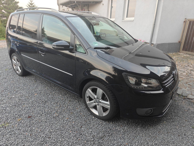Volkswagen Touran Highline — photo 11