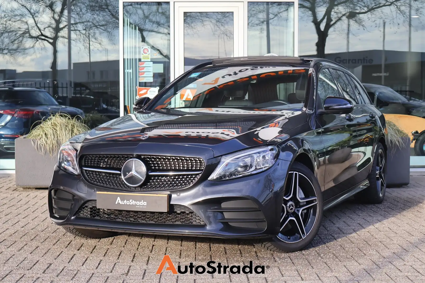 Mercedes-Benz C 300 Estate C300e AMG-Line 320pk | Pano | Sfeer | Cruis Gris - 1