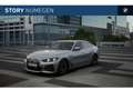BMW i4 eDrive35 M Sport / Schuif-kanteldak / Achteruitrij Grigio - thumbnail 1