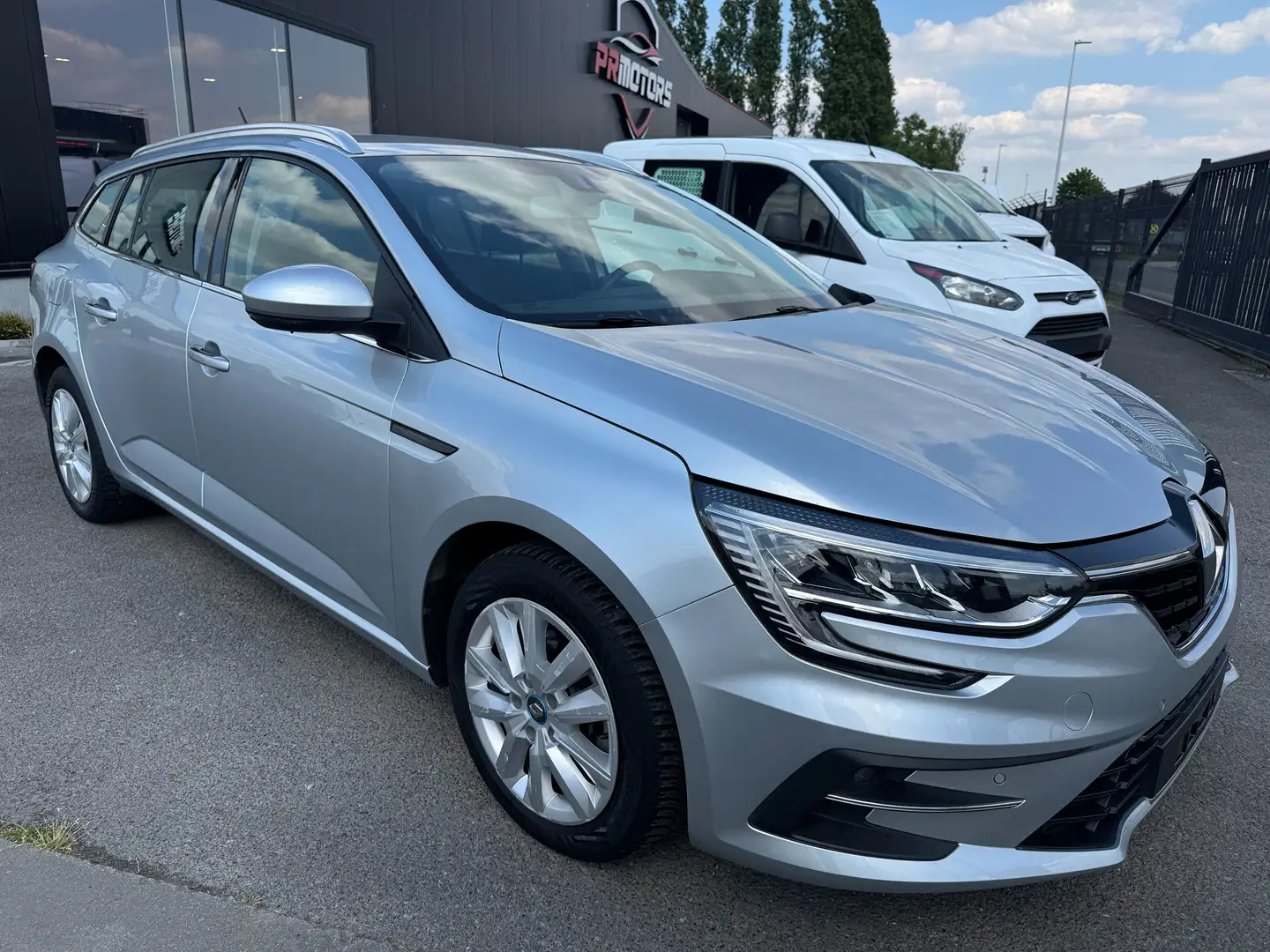 Renault Megane E-Tech 1.6 E tech grandtour hybride PHEV 1st eig ohboek Zilver - 1
