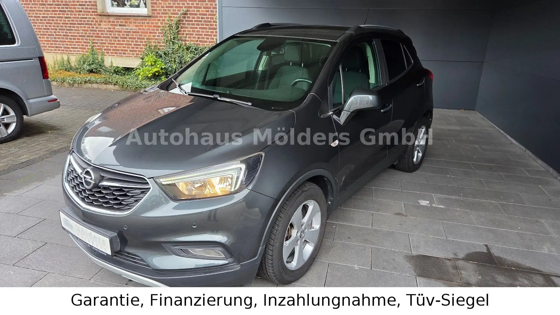 Opel Mokka X Automatik *Garantie*Navi*AHK*244€ mtl. Grau - 1