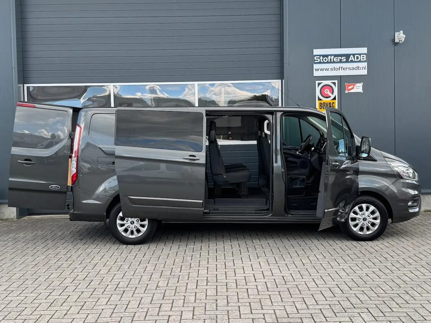 Ford Transit Custom 2.0 TDCI 131pk L2H1 Limited DC | D-RIEM NIEUW! | 2 Grijs - 2