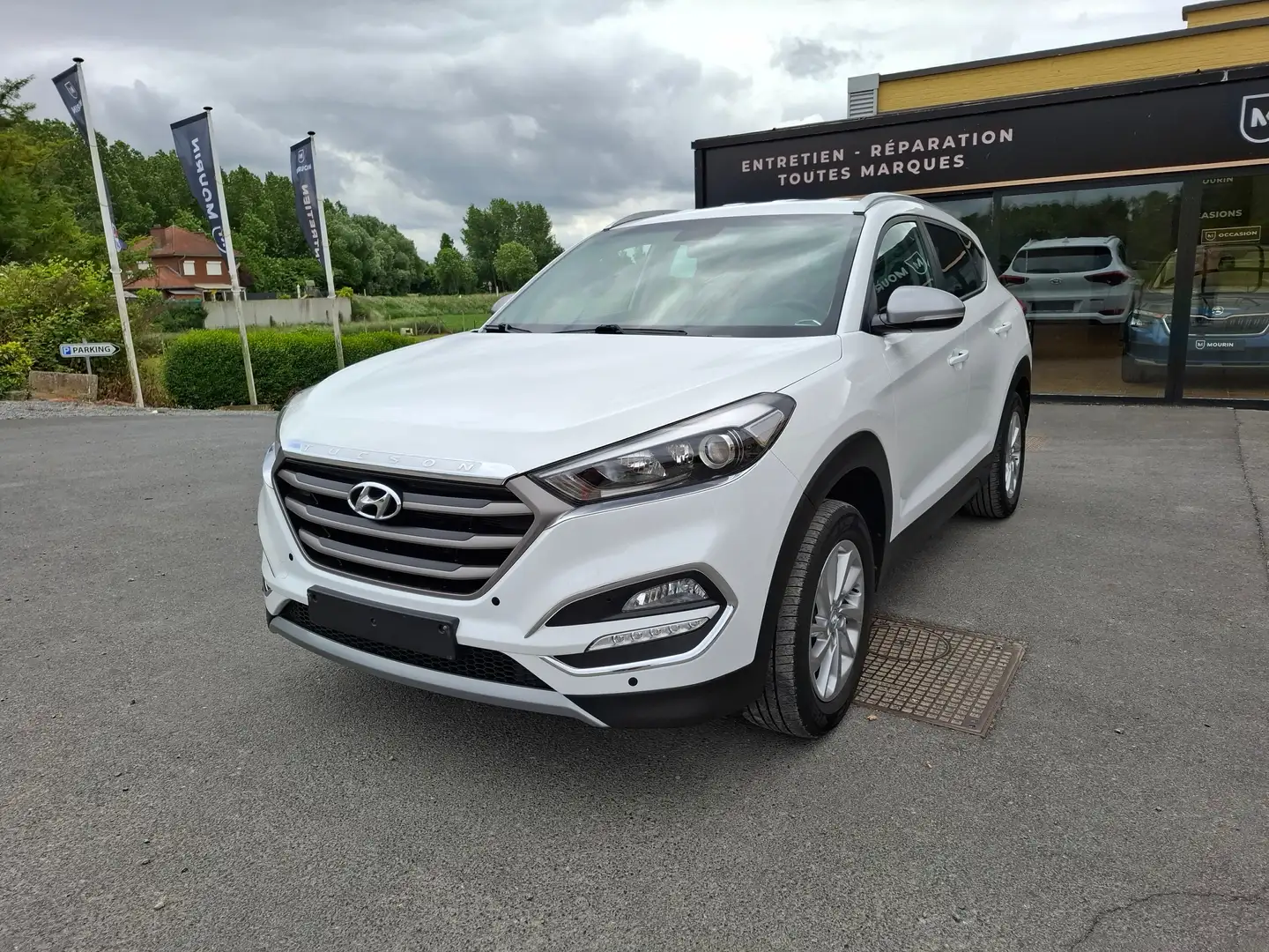 Hyundai TUCSON 1.6l PARFAIT ETAT !! ATTELAGE*GPS*CAMERA*AIRCO*JA Blanc - 1