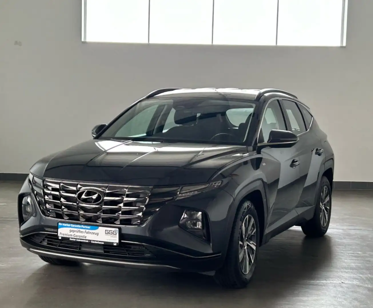 Hyundai TUCSON 1.6 CRDI AHK+LED+NAVI+AUTOMATIK Grijs - 1