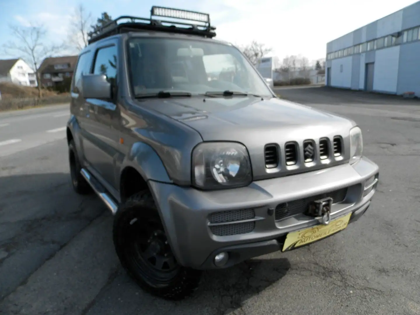 Suzuki Jimny Comfort Lim.4x4*AHK*Klima*Navi*LED Grau - 2
