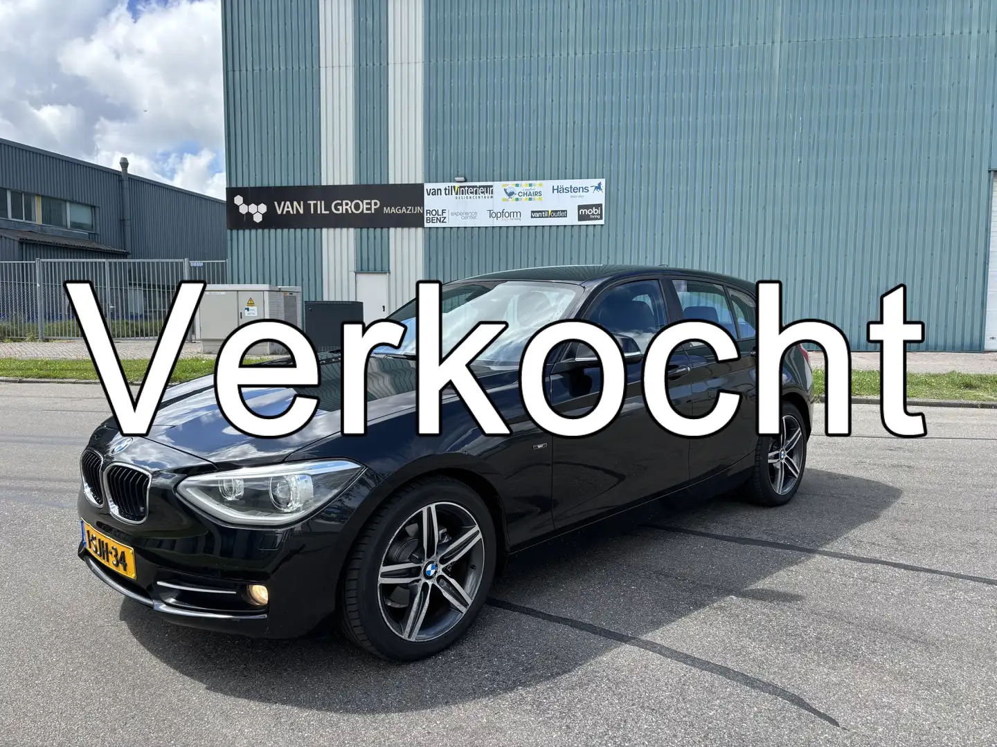 BMW 114 1-serie 114i Upgrade Edition Sport 6-Bak 102 PK. Z Zwart - 1