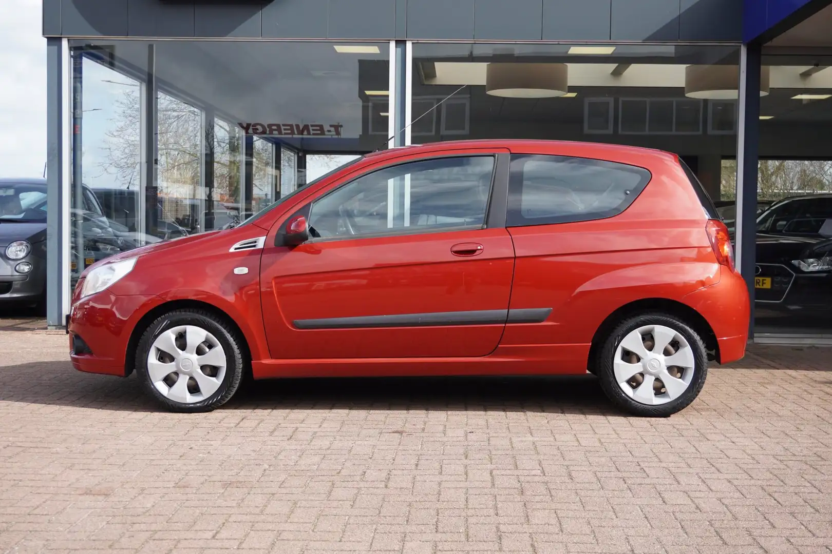 Chevrolet Aveo 1.2 16V LS+ 3deurs | Airco | Elek. pakket | 2010 | Rojo - 2