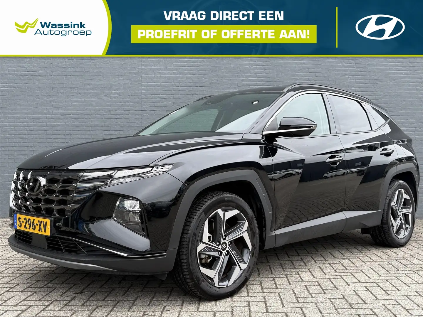 Hyundai TUCSON 1.6 T-GDi PHEV 265pk AWD Automaat Comfort Smart | Zwart - 1