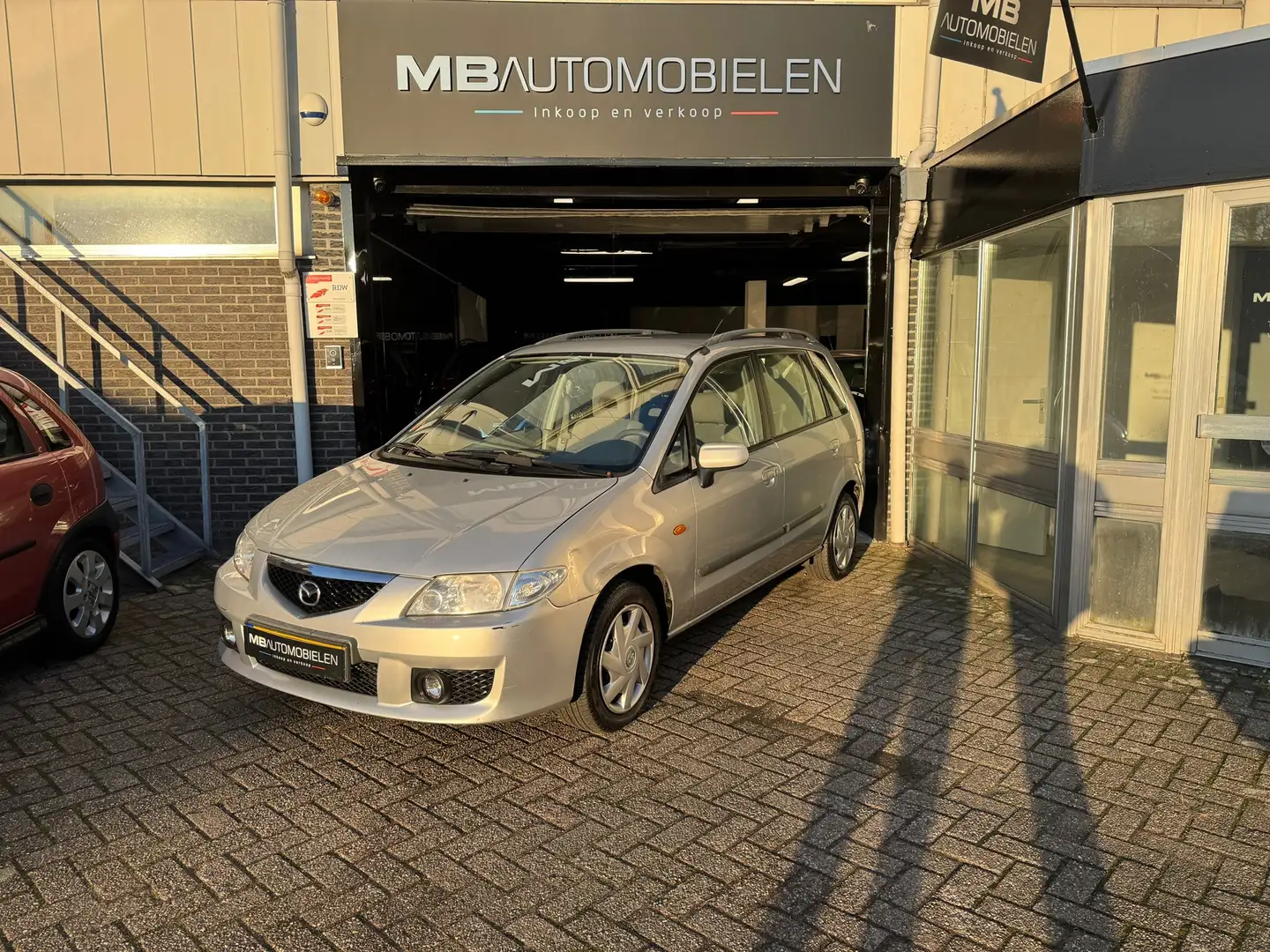 Mazda Premacy 1.8i Exclusive/ 1JAAR APK/NAP/77DKM!!/Airco/Trekha Grau - 1