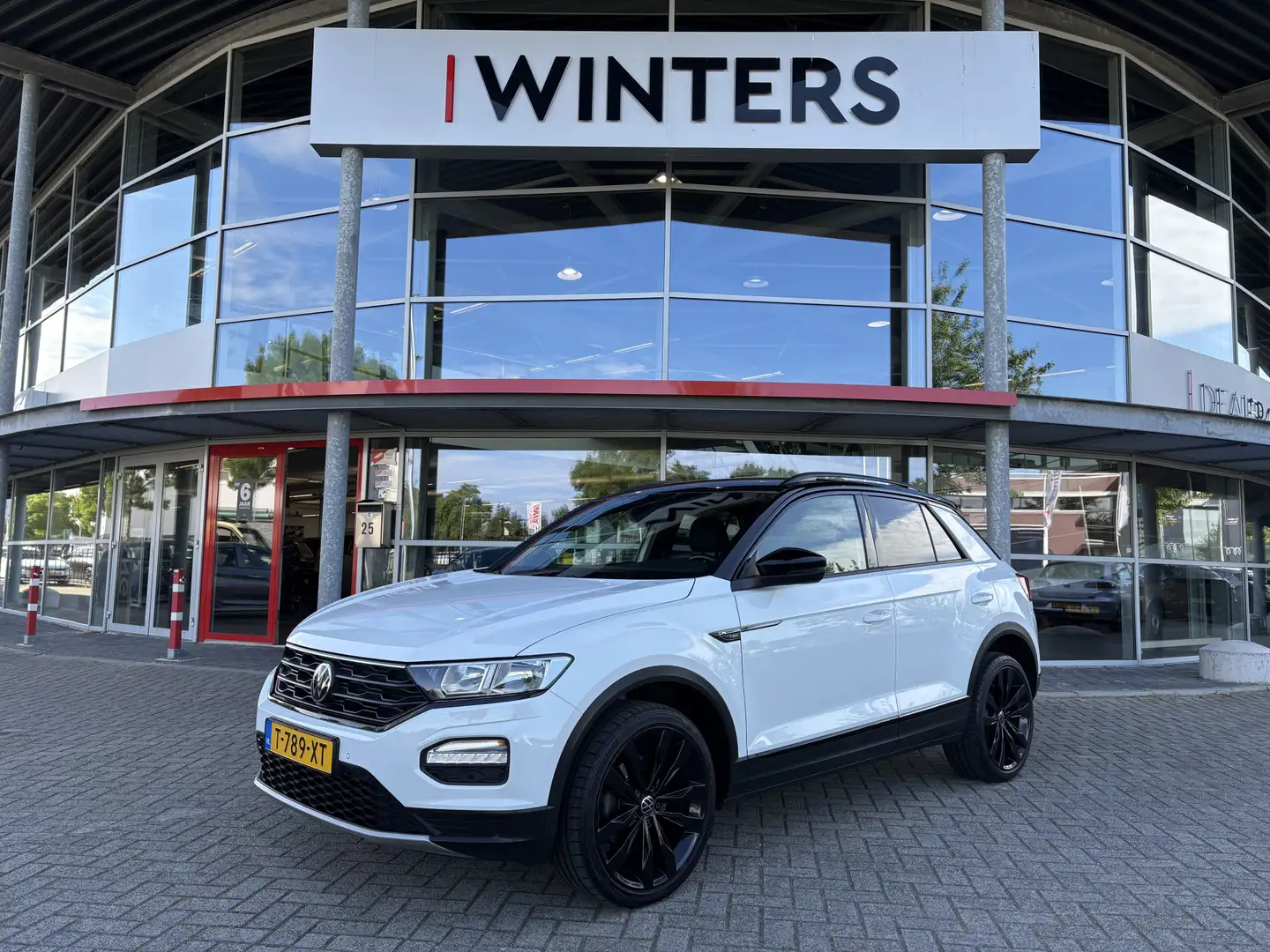 Volkswagen T-Roc 1.0 TSI Style Business | Trekhaak | Navigatie | Ad Blanco - 1