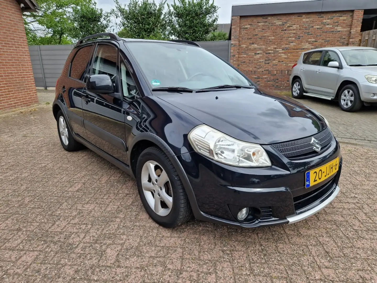 Suzuki SX4 1.6i Shogun 5-drs Airco NL-auto Trekhaak Zwart - 2
