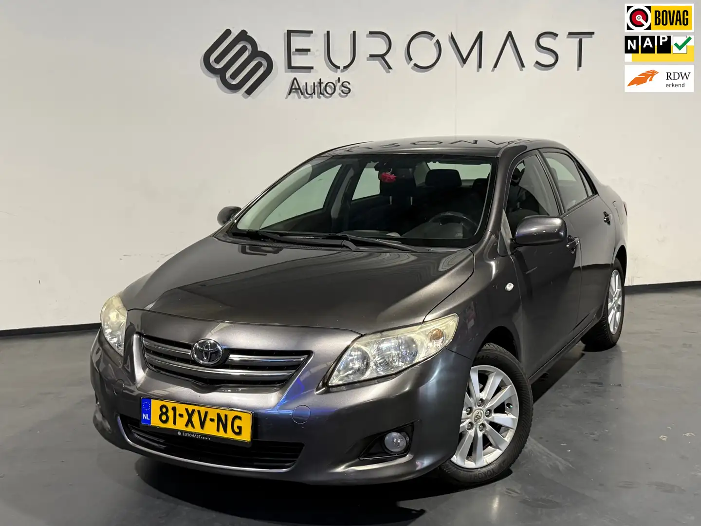 Toyota Corolla 1.6-16V Luna Airco Cruise 1ste eigenaar Trekhaak N Grijs - 1
