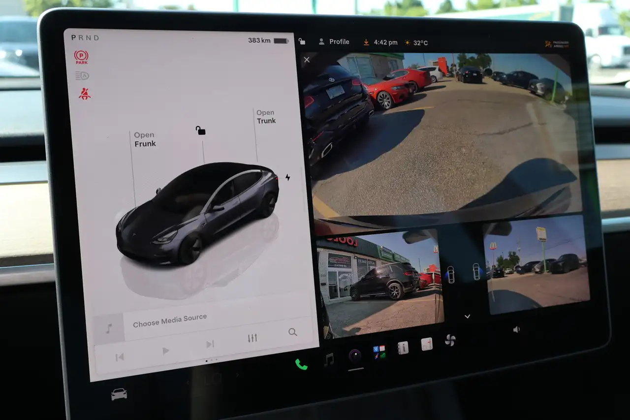 Tesla Model 3 photo Tesla Model 3