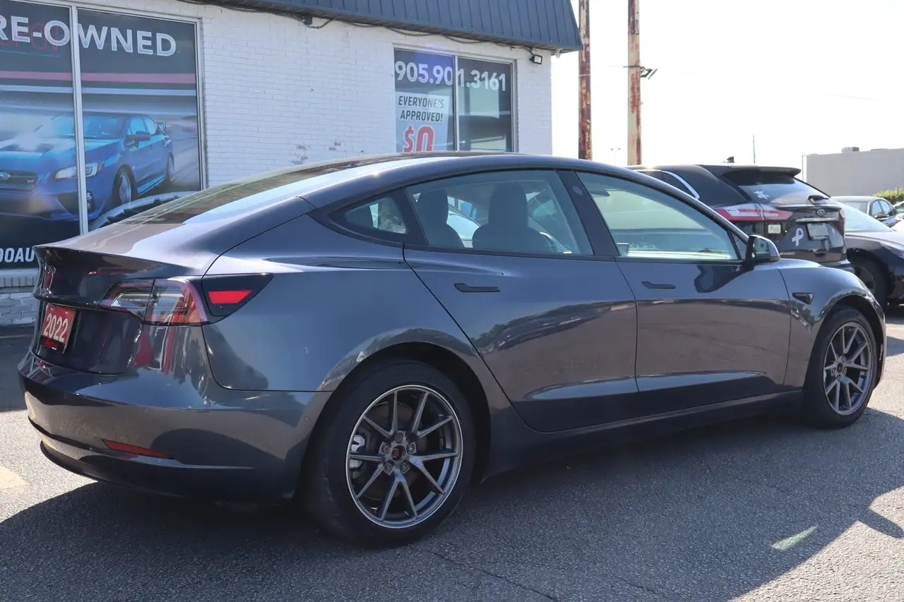 Tesla Model 3 photo Tesla Model 3