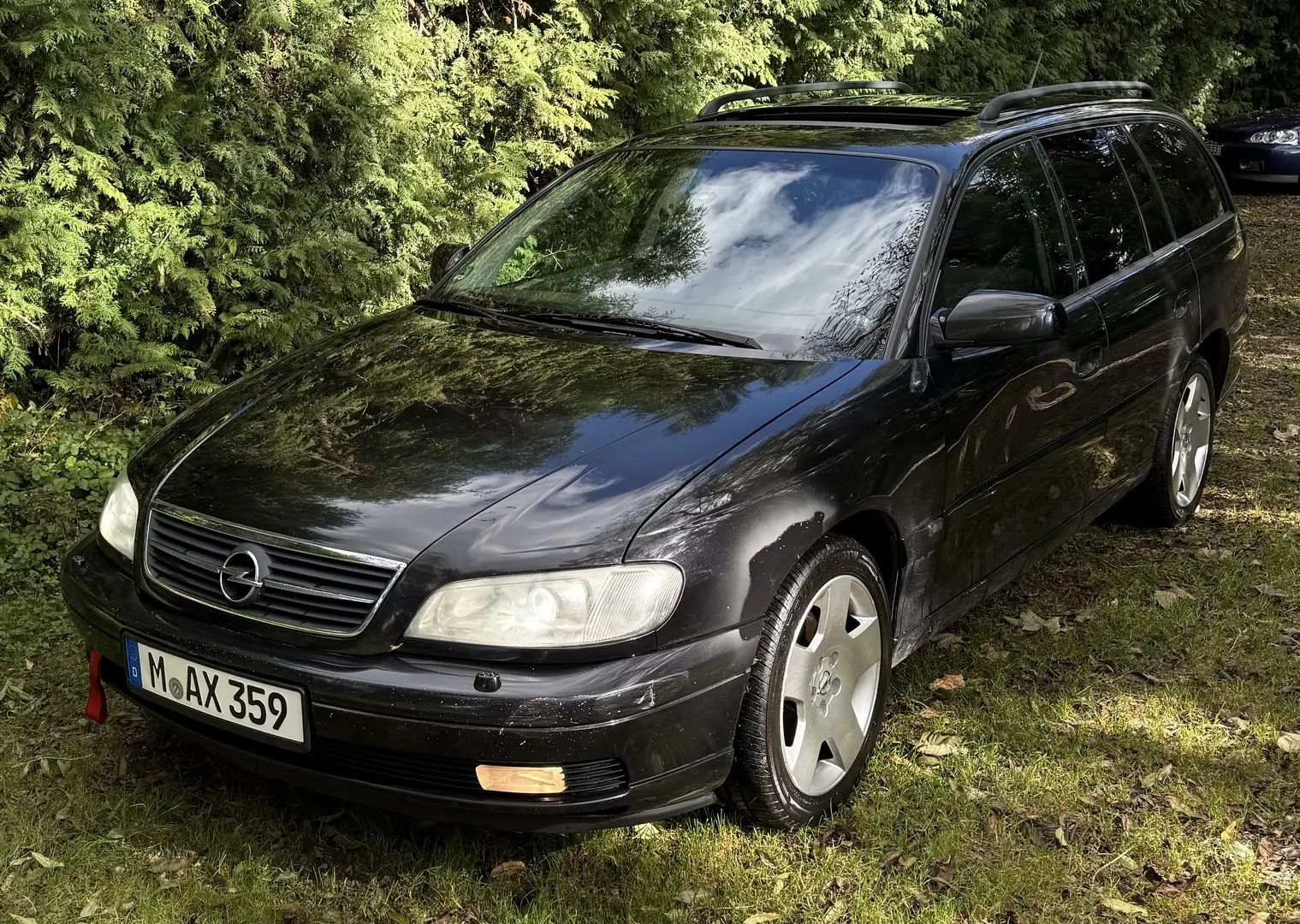 Opel Omega Caravan 2.2 16 V Edition Schwarz - 1