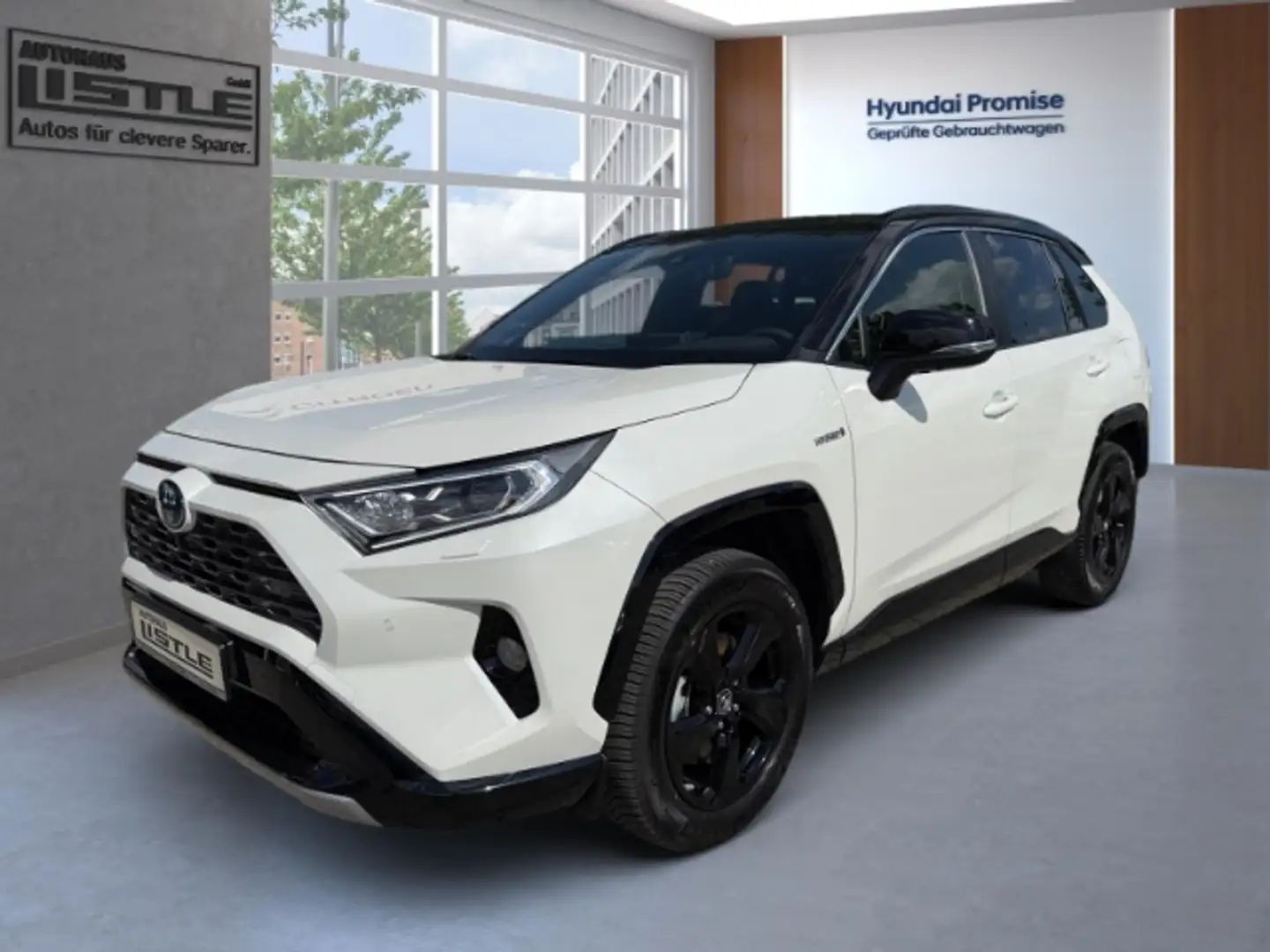 Toyota RAV 4 Hybrid 4x2 Style Selection 2.5 VVT-i Navi Leder So Weiß - 1