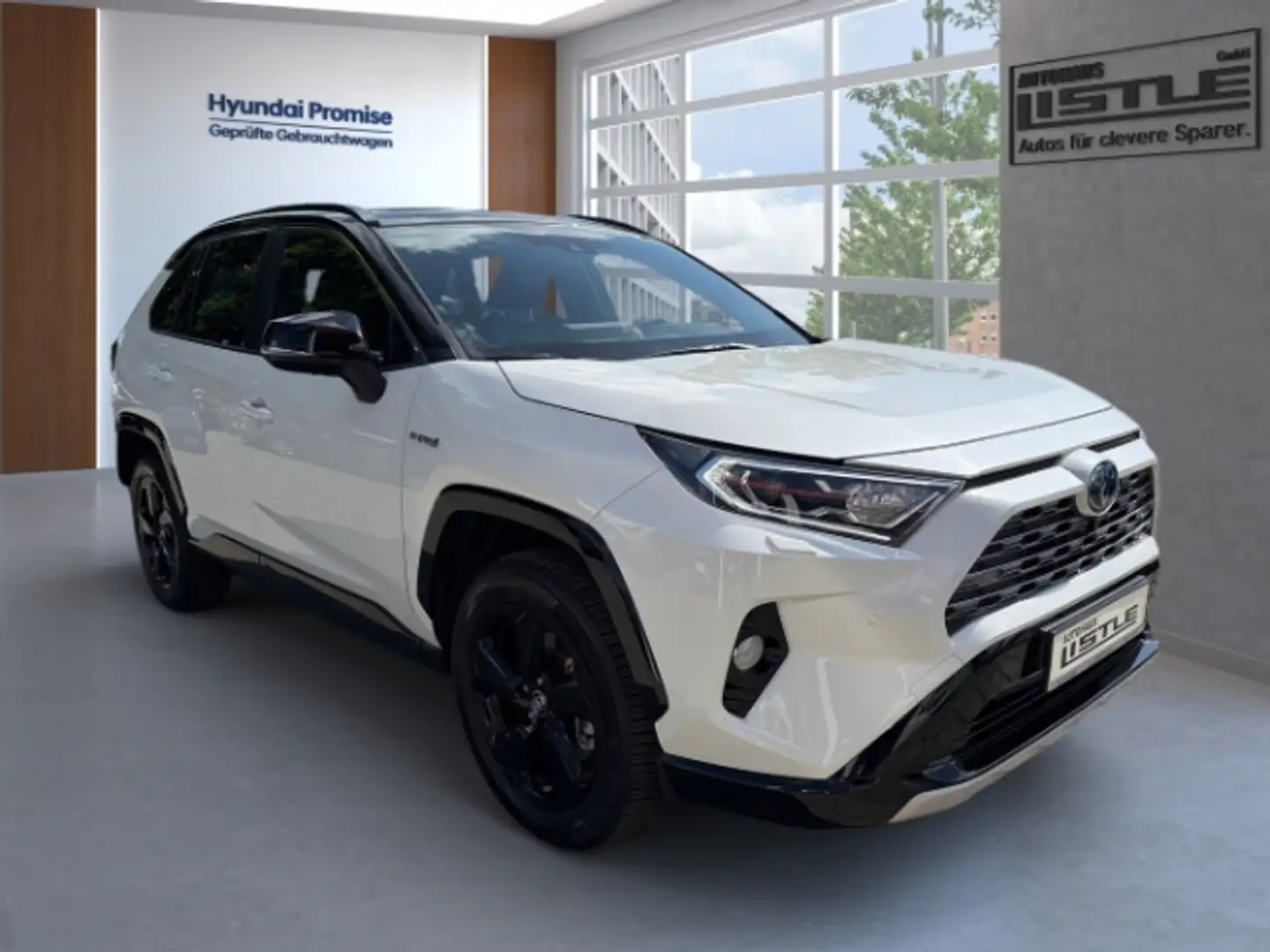 Toyota RAV 4 Hybrid 4x2 Style Selection 2.5 VVT-i Navi Leder So Weiß - 2