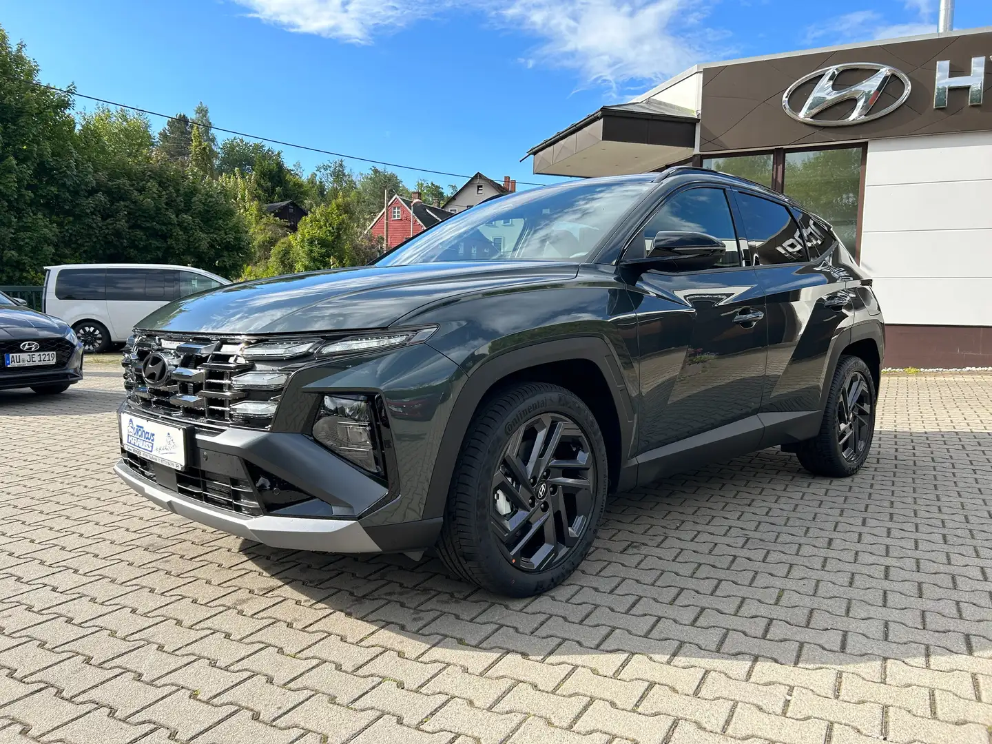 Hyundai TUCSON 1.6 T-GDi Edition Plus-Automatik-Navi-LED Groen - 1