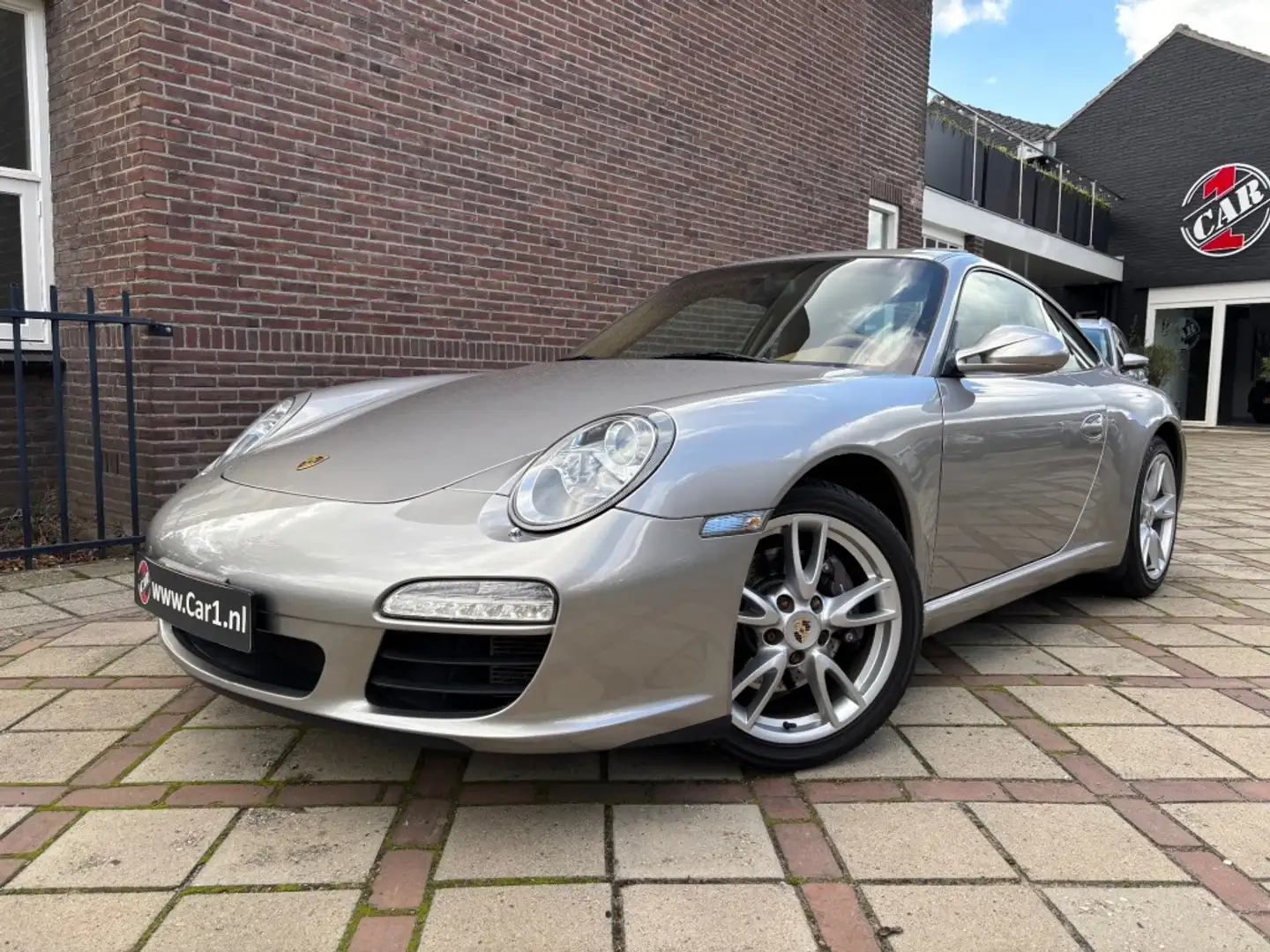 Porsche 997 Carrera PDK LEDER PDC SCHUIFDAK CRUISE 1e EIG Grijs - 1