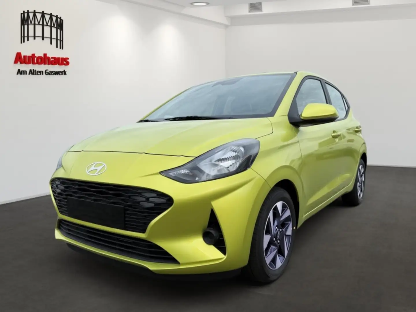 Hyundai i10 AUTOMATIK+NAVI+SITZHZG+KAMERA+ALU+LENKRADHZG Giallo - 1
