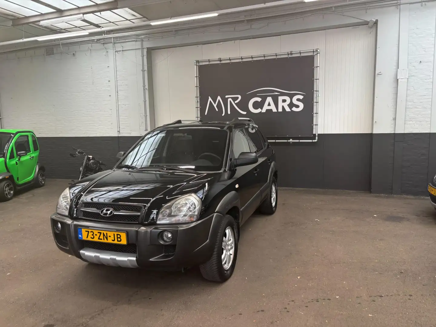 Hyundai TUCSON 2.0i Dynamic Cross airco Zwart - 2
