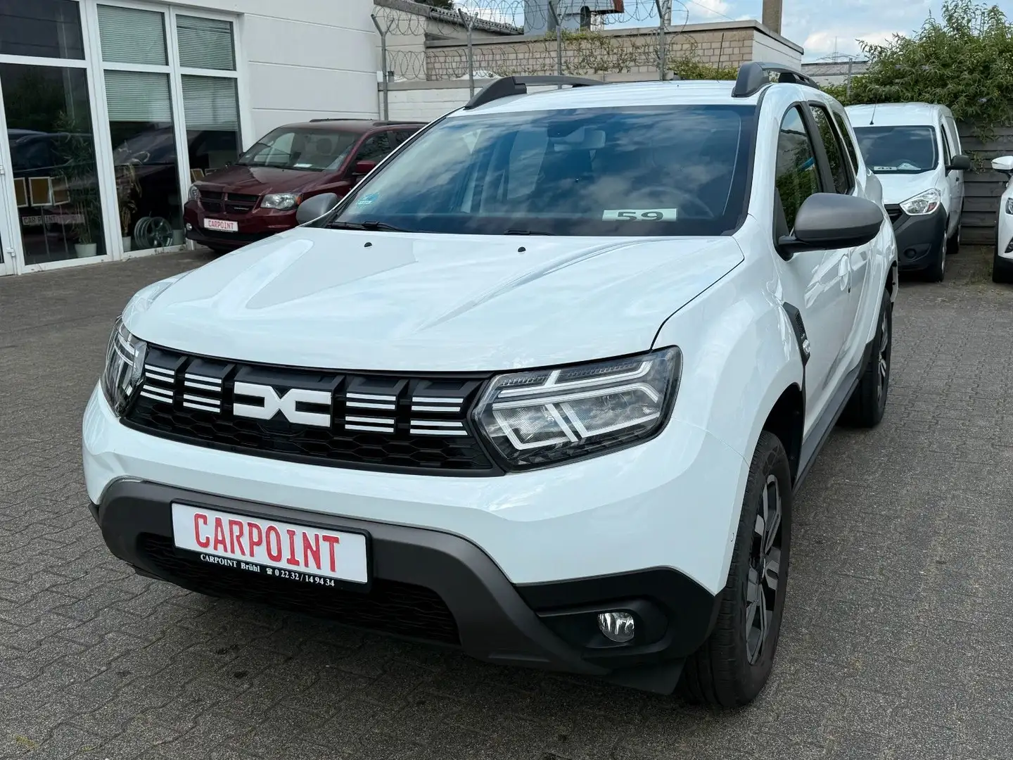 Dacia Duster II Journey 1.HAND/KLIMAAUT/KAMERA/NAVI Weiß - 1