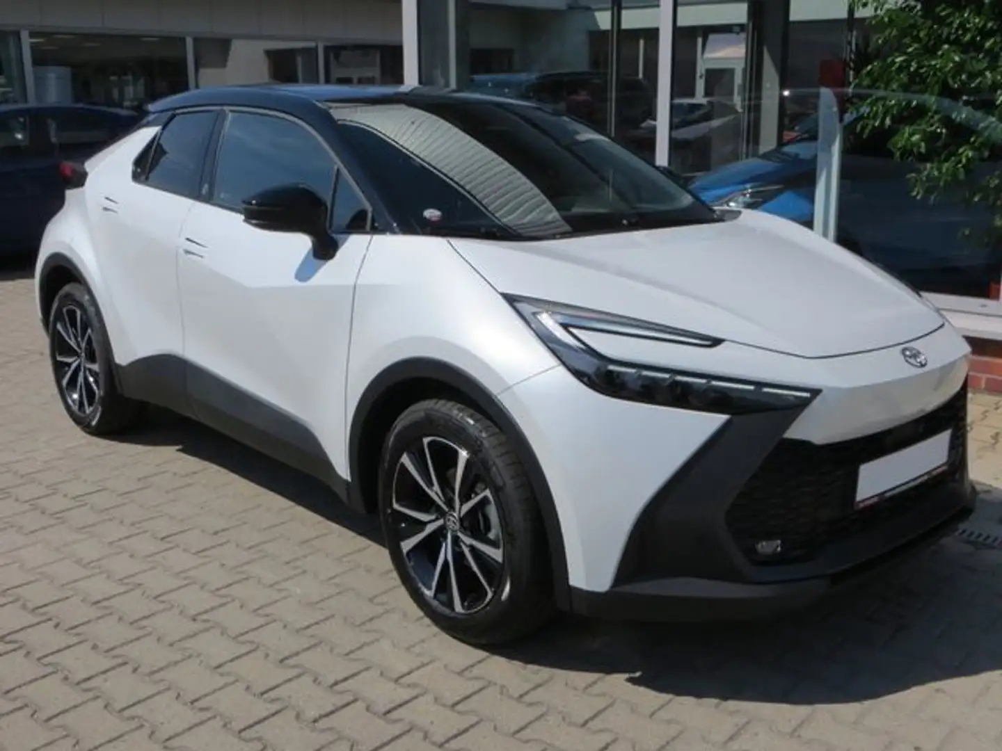 Toyota C-HR 2.0 Hybrid Team D*LED*ACC*NAVI*KAM*TOTW Weiß - 1