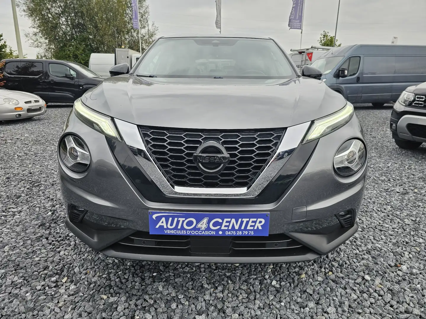 Nissan Juke 1.0 DIG-T 2WD // GPS / GARANTIE 1 AN // Grijs - 2