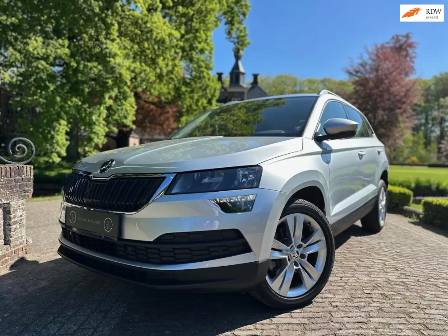 Skoda Karoq 1.0 TSI | DSG | Navi | Keyless | Dealer Onderhoude Srebrny - 1