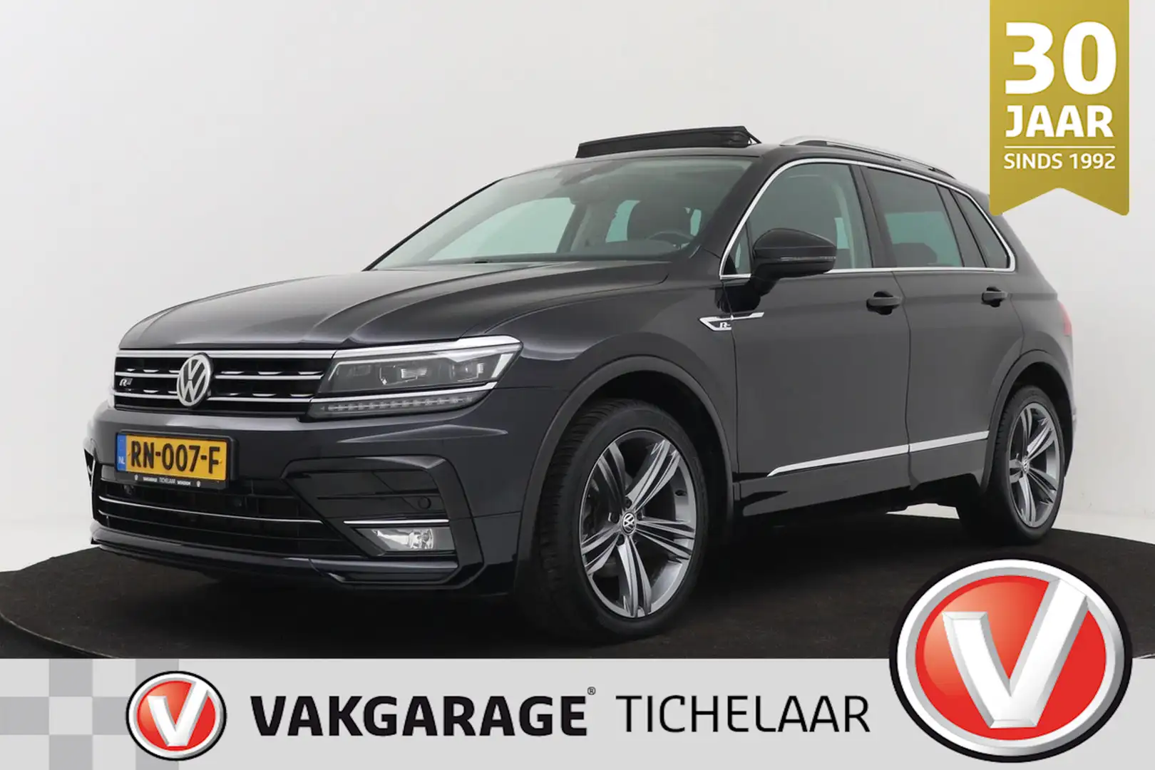 Volkswagen Tiguan 1.4 TSI ACT Highline | R-Line | Panoramadak | CarP Zwart - 1
