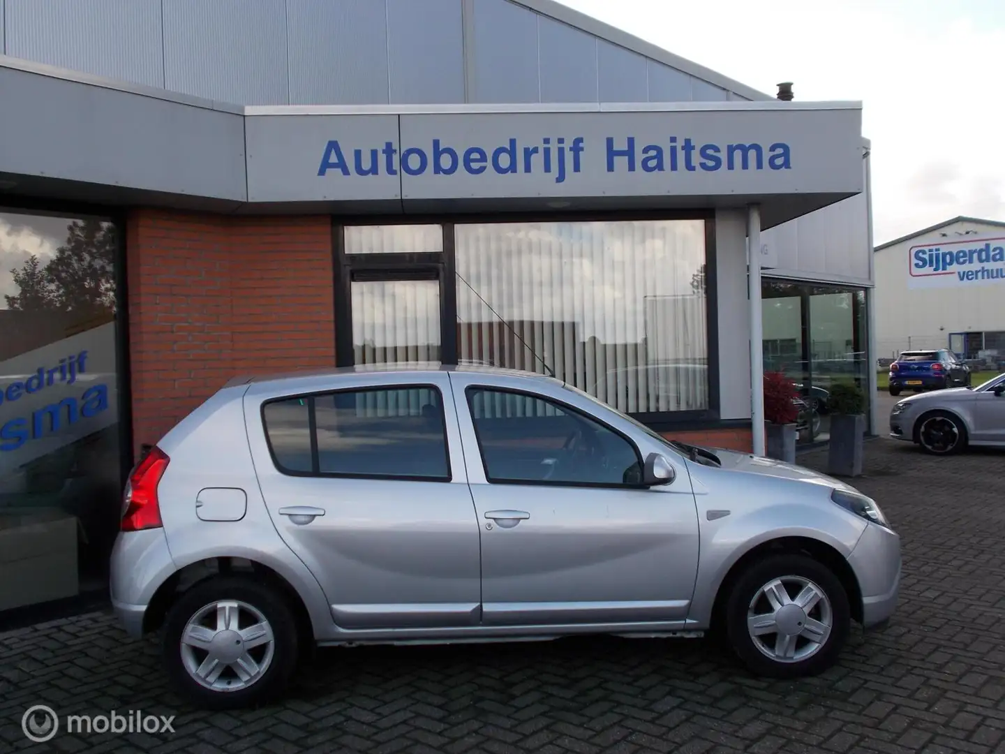 Dacia Sandero 1.2 Blackline airco 25.544 KM !!! Silber - 2