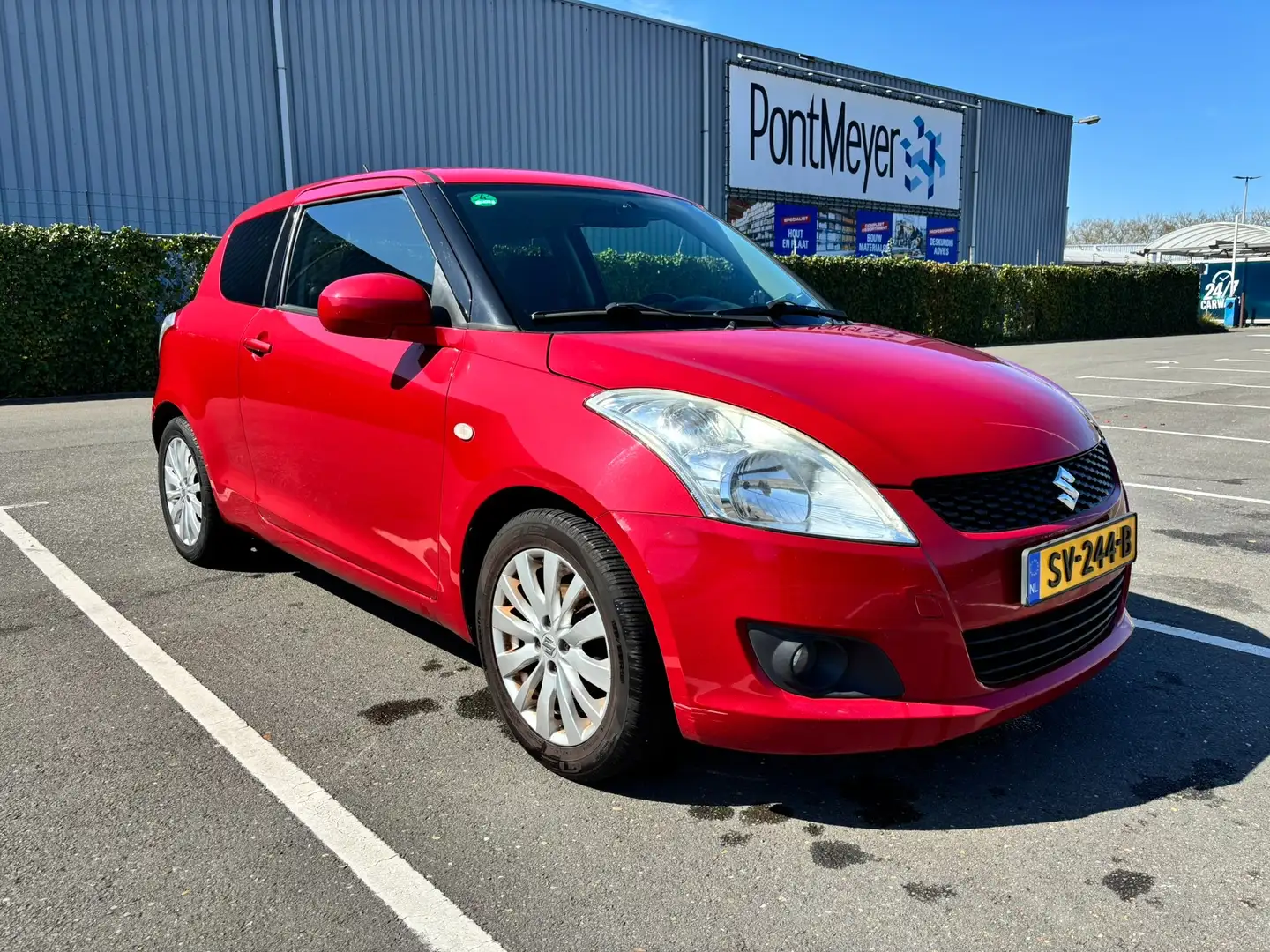 Suzuki Swift 1.2 Base 2012 (APK 12-2025) Rojo - 1