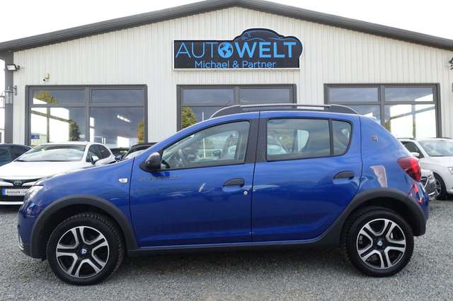 Imagine Dacia Sandero 0.9 Aut.KLIMAAUT KAM DAB NAV TÜV+InspNeu